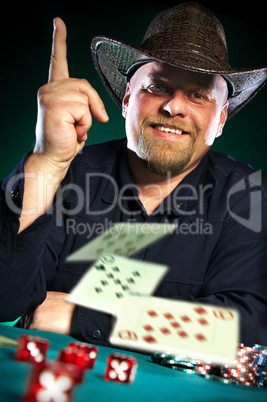 man with a beard plays poker