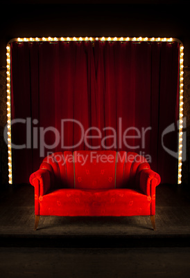 red sofa on the stage