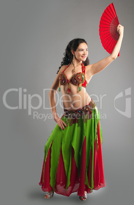 Girl in oriental arabian costume with fan