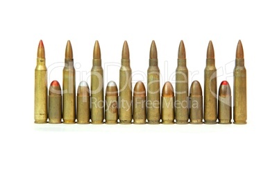 Row of alternating M16 assault rifle and 9mm Parabellum cartridges isolated