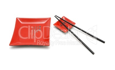 Chopsticks, red square plate and red saucer