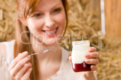 Young healthy woman enjoy natural yogurt country