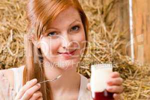 Young healthy woman enjoy natural yogurt country