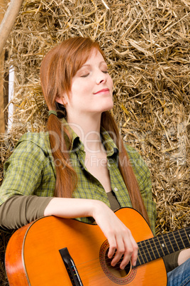 Young country woman relax with guitar