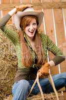 Crazy young cowgirl horse-riding country style