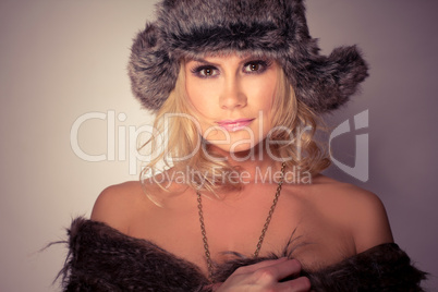Fashion Wearing woman in fur Hat And Coat