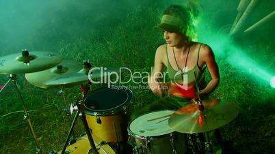 Drummer in green
