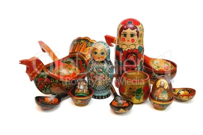 Assorted Russian folk wooden toys and utensils isolated