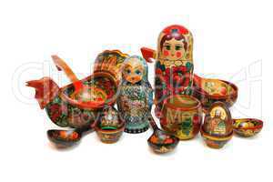 Assorted Russian folk wooden toys and utensils isolated