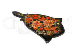 Russian traditional black cutting board painted with flowers isolated