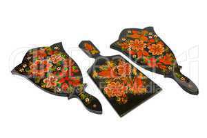 Three Russian black cutting board painted with flowers isolated