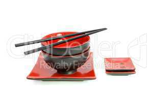 Red and black oriental table set isolated