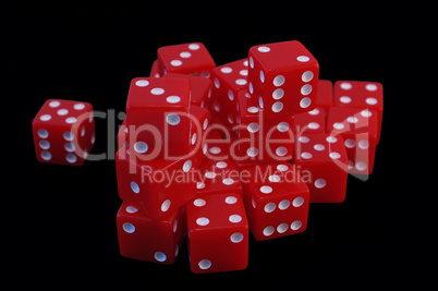isolated dice over black