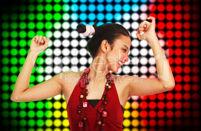 Beautiful Young Woman Dancing At A Club