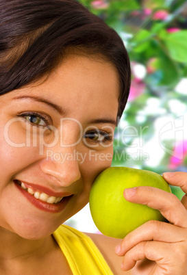 Young Lady About To Eat An Apple