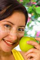 Young Lady About To Eat An Apple