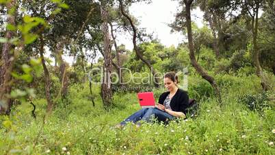beautiful girl using computer in countryside 4