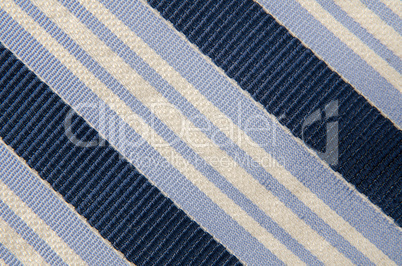 Closeup view of a striped neck tie
