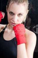 Boxing training blond woman sparring