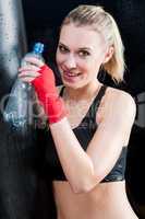 Boxing training woman drink water