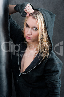 Blond sexy boxing woman in black portrait