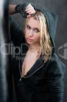 Blond sexy boxing woman in black portrait