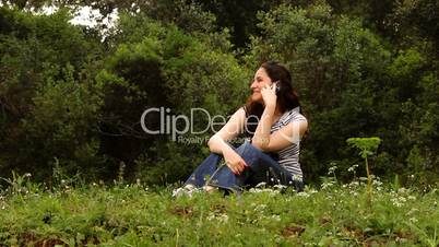 beautiful girl talking on the phone in countryside 2