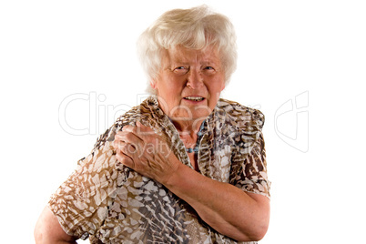 Seniorin mit Schulterbeschwerden