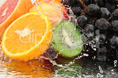 Pure fruit in a spray of water