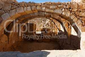 Converging ancient stone arches