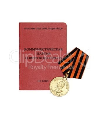 Soviet communist party membership card with old medal isolated
