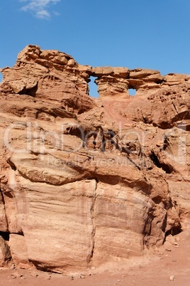 Scenic weathered orange rock in stone desert