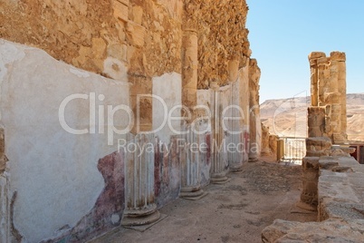 Ruins of wall and colonnade of ancient Masada palace of King Herod in Israel