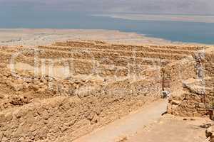Ruins of ancient Masada fortress in the desert near the Dead Sea in Israel