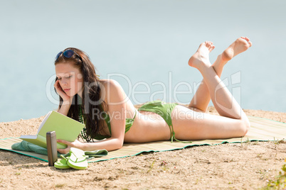 Summer beach woman relax with book bikini