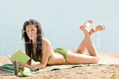 Summer beach woman relax with book bikini