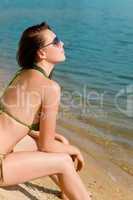 Summer woman in bikini alone on beach