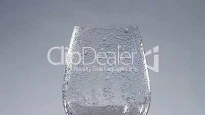 Fresh water pouring into glass
