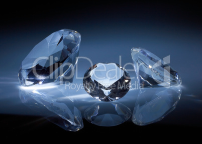 Shiny diamonds jewel on dark blue