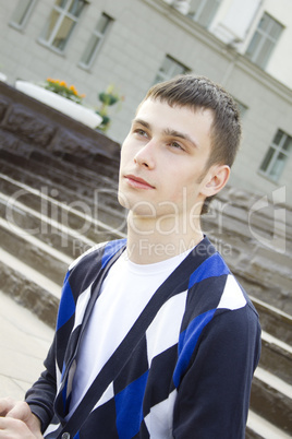 Attractive guy student on campus