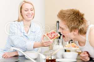 Breakfast happy couple man feed woman toast