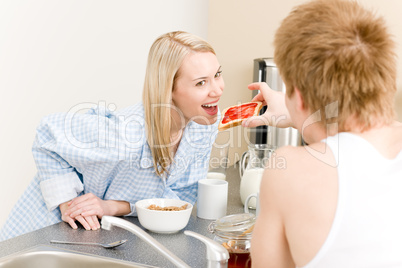 Breakfast happy couple man feed woman toast