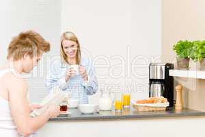 Breakfast happy couple drink coffee read newspaper
