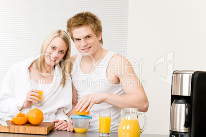 Breakfast happy couple make orange juice morning