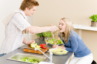 Lunch couple cook salad man feeding woman