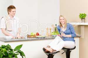 Lunch happy couple cook salad in kitchen