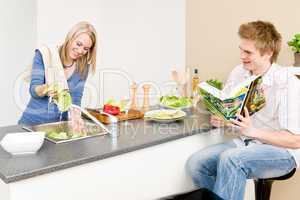 Lunch happy couple cook salad wash lettuce