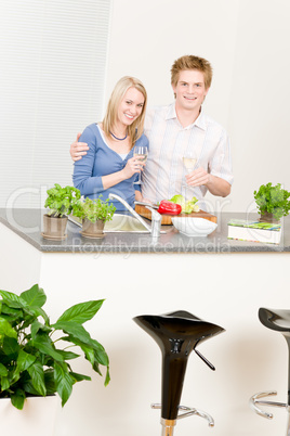 Lunch happy couple cook salad enjoy wine