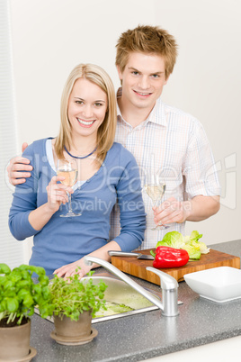 Lunch happy couple cook salad enjoy wine