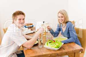 Happy couple enjoy wine eat fit salad